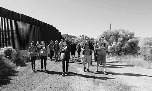 students walking at the border