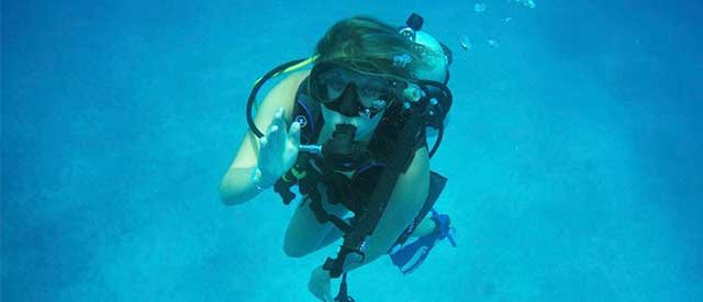 alumni student scuba diving